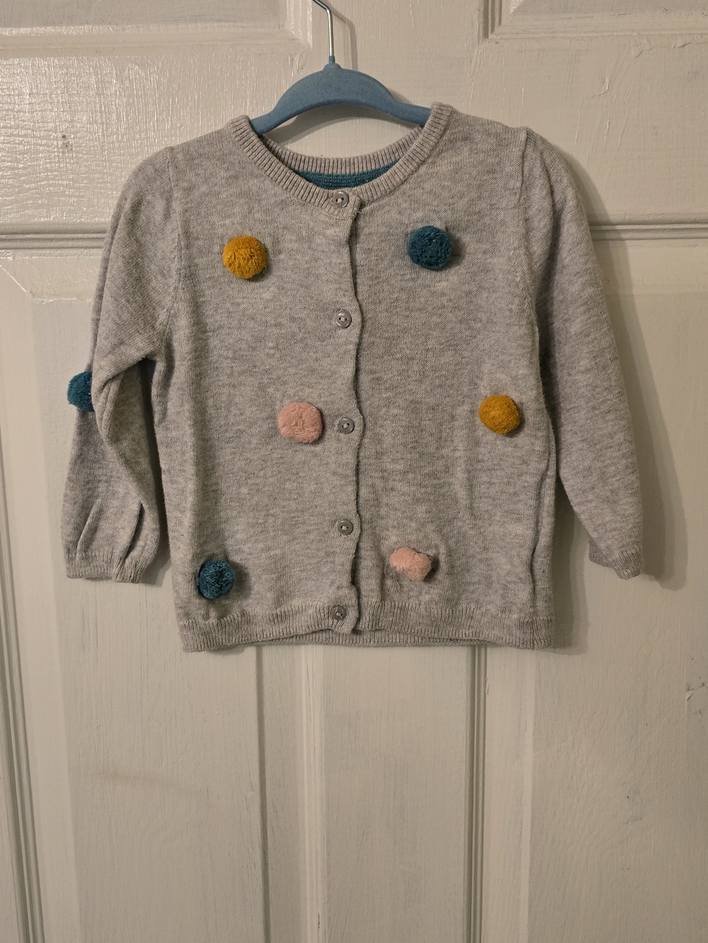 H&M Light Gray Cardigan with Pink, Teal, and Mustard Pom-Poms
